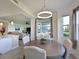Bright dining room with table and chairs, offering view to living area at 1010 Tidewater Shores Loop # 103, Bradenton, FL 34208
