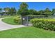 Fenced dog park with grassy area and gate at 1010 Tidewater Shores Loop # 103, Bradenton, FL 34208