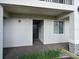 Private condo entrance with covered patio at 1010 Tidewater Shores Loop # 103, Bradenton, FL 34208