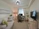 Home office features a comfortable couch and a work desk at 1010 Tidewater Shores Loop # 103, Bradenton, FL 34208