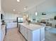 Modern kitchen featuring a large island and stainless steel appliances at 1010 Tidewater Shores Loop # 103, Bradenton, FL 34208