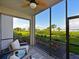Relaxing screened lanai with scenic water views at 1010 Tidewater Shores Loop # 103, Bradenton, FL 34208