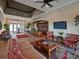 Community clubhouse lobby with comfortable seating and a library at 1010 Tidewater Shores Loop # 103, Bradenton, FL 34208