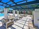 Community patio with fireplace and seating area at 1010 Tidewater Shores Loop # 103, Bradenton, FL 34208