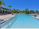 Resort-style pool with plenty of lounge chairs at 1010 Tidewater Shores Loop # 103, Bradenton, FL 34208