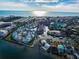 Aerial view of waterfront community with boats and pools at 1325 Siesta Bayside Dr # 1325B, Sarasota, FL 34242