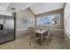 Small dining area with table and chairs at 1325 Siesta Bayside Dr # 1325B, Sarasota, FL 34242