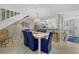 Dining room with a table and chairs, open to the kitchen at 1325 Siesta Bayside Dr # 1325B, Sarasota, FL 34242