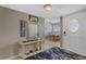 Bright entryway with mirror and console table at 1325 Siesta Bayside Dr # 1325B, Sarasota, FL 34242