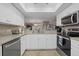 Kitchen with granite countertops and stainless steel appliances at 1325 Siesta Bayside Dr # 1325B, Sarasota, FL 34242