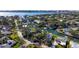 Aerial view of house and surrounding waterfront community at 1827 Baywood Dr, Sarasota, FL 34231