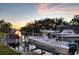 Scenic waterfront property with private boat dock and beautiful sunset views at 1827 Baywood Dr, Sarasota, FL 34231