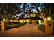 Elegant two-story home with a landscaped yard and brick driveway at 1827 Baywood Dr, Sarasota, FL 34231
