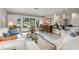 Bright living room with open floor plan and access to backyard at 1827 Baywood Dr, Sarasota, FL 34231