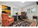 Bright home office with comfortable seating and large desk at 1827 Baywood Dr, Sarasota, FL 34231
