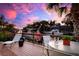 Enjoy sunset views from this waterfront deck with seating at 1827 Baywood Dr, Sarasota, FL 34231
