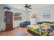 Spacious bedroom with a comfortable chaise lounge and plenty of storage at 2343 Prospect St, Sarasota, FL 34239
