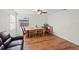 Light-filled dining area featuring hardwood floors and a casual dining setting at 2343 Prospect St, Sarasota, FL 34239