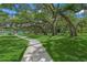 Park with a walking path under large shade trees at 2343 Prospect St, Sarasota, FL 34239
