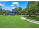 Modern playground with slides, climbing structures, and shade at 2343 Prospect St, Sarasota, FL 34239