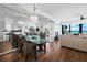 Elegant dining area with glass table and ocean view at 4241 Gulf Of Mexico Dr # 202, Longboat Key, FL 34228