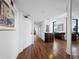 Condo hallway with hardwood floors and access to rooms at 4241 Gulf Of Mexico Dr # 202, Longboat Key, FL 34228
