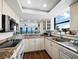 Updated kitchen features granite counters and stainless appliances at 4241 Gulf Of Mexico Dr # 202, Longboat Key, FL 34228