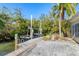 Private dock and boat lift provide easy water access at 563 Juan Anasco Dr, Longboat Key, FL 34228