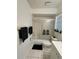Simple bathroom with shower/tub combo and white vanity at 601 N Hercules Ave # 1403, Clearwater, FL 33765