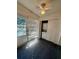 Bright laundry room with washer, dryer, and storage cabinets at 601 N Hercules Ave # 1403, Clearwater, FL 33765