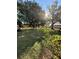 Landscaped lawn with mature trees and sunny exposure at 601 N Hercules Ave # 1403, Clearwater, FL 33765