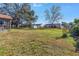 Large backyard with grassy area, providing ample space for recreation at 6025 62Nd E Ct, Palmetto, FL 34221