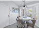 Kitchen dining area with round table and four chairs at 6025 62Nd E Ct, Palmetto, FL 34221