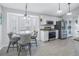 Eat-in kitchen with stainless steel appliances and white cabinets at 6025 62Nd E Ct, Palmetto, FL 34221
