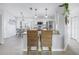Kitchen island with two wicker barstools at 6025 62Nd E Ct, Palmetto, FL 34221