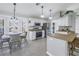 Open concept kitchen with island and stainless steel appliances at 6025 62Nd E Ct, Palmetto, FL 34221