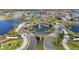 Grand entrance to a luxury community with a fountain and landscaping at 8328 Sea Glass Ct, Sarasota, FL 34240