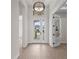 Bright and spacious entryway with a view of the front yard at 8328 Sea Glass Ct, Sarasota, FL 34240