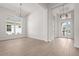 Elegant entryway with tile flooring and a chandelier at 8328 Sea Glass Ct, Sarasota, FL 34240
