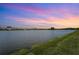 Peaceful lake view at sunset in a tranquil community at 8328 Sea Glass Ct, Sarasota, FL 34240