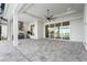 Outdoor kitchen with stainless steel appliances and built-in grill at 8328 Sea Glass Ct, Sarasota, FL 34240