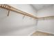 Large walk-in closet with custom wood shelving at 8328 Sea Glass Ct, Sarasota, FL 34240