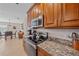 Spacious kitchen features stainless steel appliances and ample counter space at 8755 Dolomite Ave, North Port, FL 34287