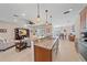 Modern kitchen with granite countertops and stainless steel appliances at 8755 Dolomite Ave, North Port, FL 34287