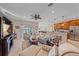 Bright and airy living room features a large TV and comfortable seating at 8755 Dolomite Ave, North Port, FL 34287