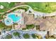 Aerial view of community clubhouse, pool, and golf course at 8912 Heritage Sound Dr, Bradenton, FL 34212