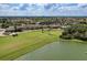 Expansive view of community including golf course and lake at 8912 Heritage Sound Dr, Bradenton, FL 34212