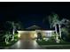 Well-maintained single-story home showcasing attractive curb appeal at night at 8912 Heritage Sound Dr, Bradenton, FL 34212