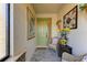 Inviting front entry with a sitting area and sunflowers at 8912 Heritage Sound Dr, Bradenton, FL 34212