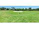 Golf course with sand trap and lush green grass at 8912 Heritage Sound Dr, Bradenton, FL 34212